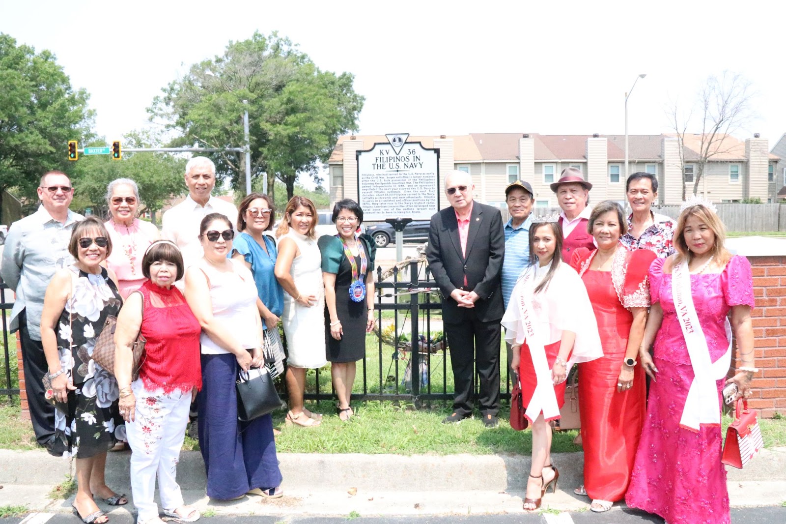 Ambassador Romualdez with CUFOT President Dr. Cynthia Romero (flanking both sides of the marker) and other leaders pose in front of the historical highway marker honoring Filipino navy veterans. The historical marker was unveiled in 2022 and is situated right in front of the Philippine Cultural Center of Virginia Beach.