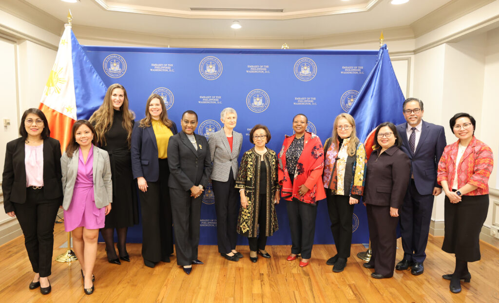 Former Philippine Secretary of Foreign Affairs Delia Domingo Albert (center) with members of the diplomatic corps and the Philippine Embassy