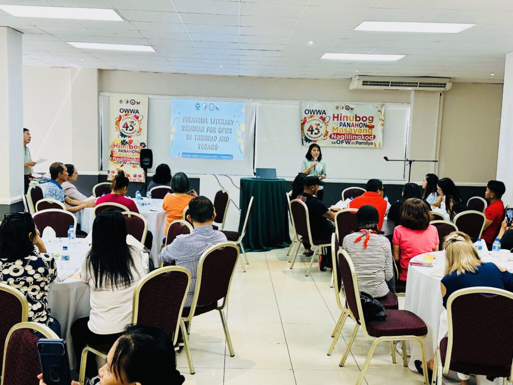 Welfare Officer Mae Codilla welcomes attendees during the seminar, which was also conducted in celebration of OWWA’s 43rd anniversary.