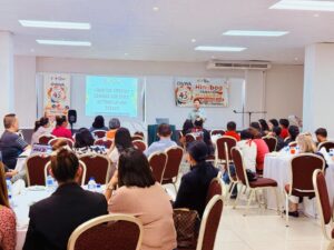 Labor Attaché Saul De Vries welcomes the forty-six OFW attendees of the financial literacy seminar on 4 May 2025 at the Cascadia Hotel Conference Centre.