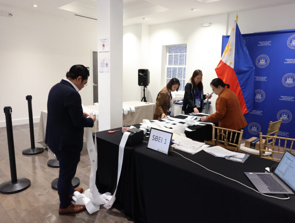 The Special Board of Election Inspectors print election returns for its clustered precinct.
