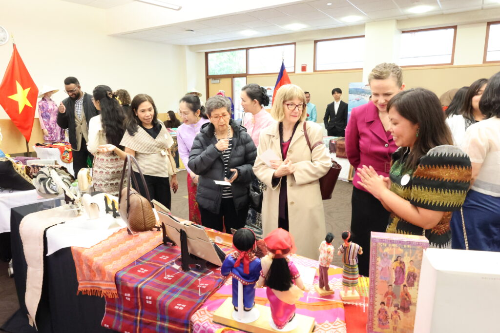 The Philippine booth displays iconic traditional attire, textiles, and accessories in relation to modern fashion trends and culture.