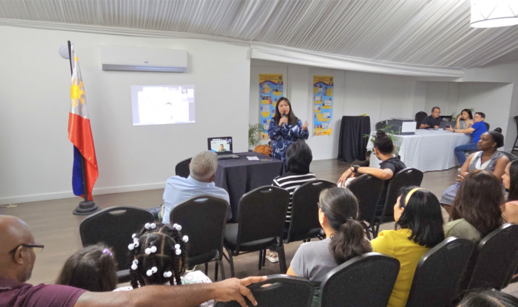 Consul Barbie Rosales updates the community on various programs of the Embassy during the town hall meeting with the Filipino community in Kingston, Jamaica on 30 April 2025.