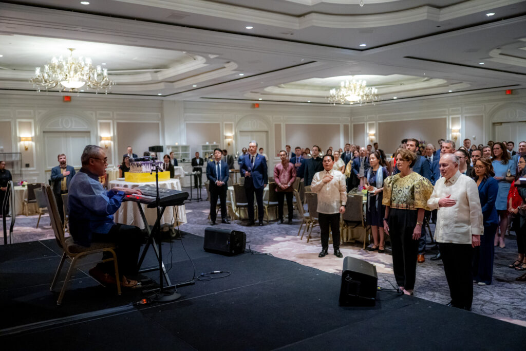 Filipino-American pianist and tenor Carlos Ibay performs the Philippine and U.S. national anthems.