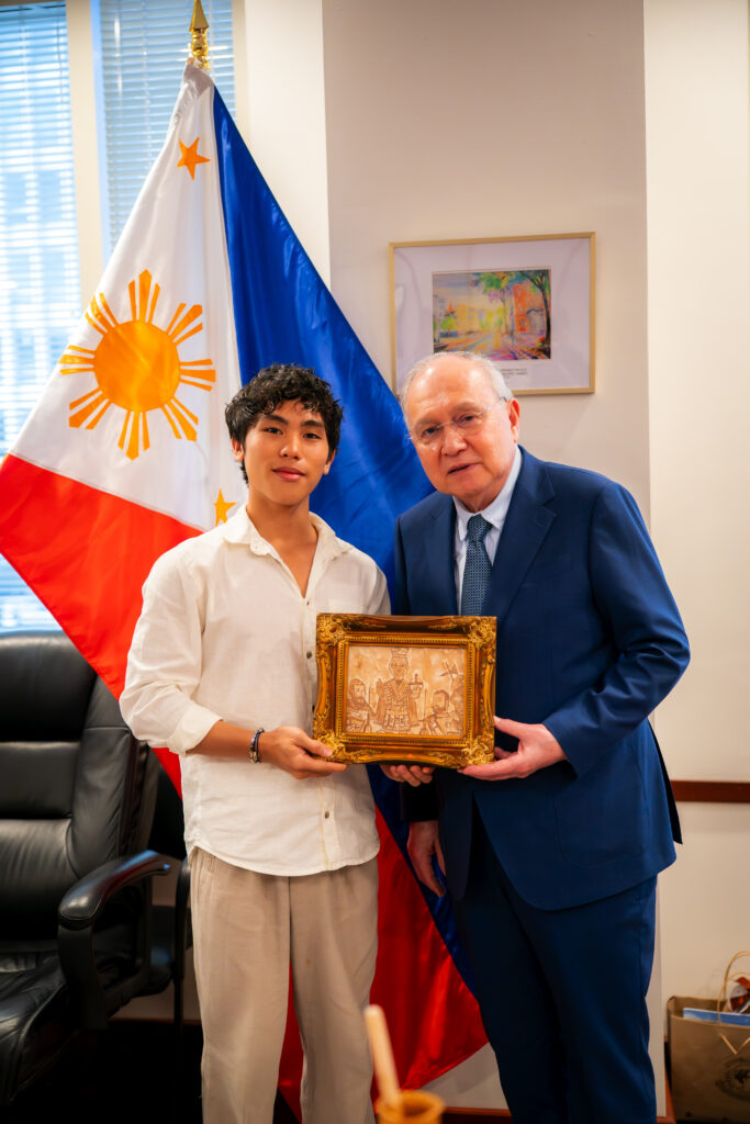 The Chocolate Chamber’s resident artist John Paul 'JP' Choa presents Ambassador Romualdez with a chocolate ink artwork of the Sto. Niño, highlighting the fusion of Filipino faith and cacao craftsmanship deeply rooted in his native province of Cebu.