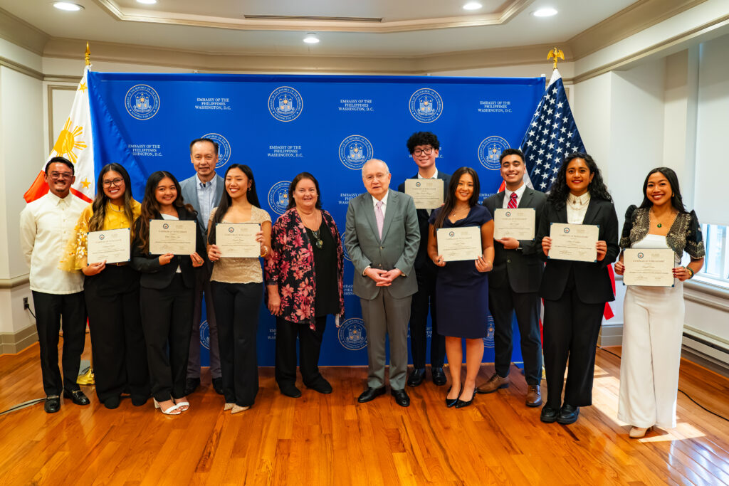 Ambassador Jose Manuel Romualdez (center), US-Asia Institute (USAI) Vice Chairman Ben Wu (back row, left), and USAI President Mary Sue Bissell (center) pose proudly with graduates of the 2025 IMPACT! Program.