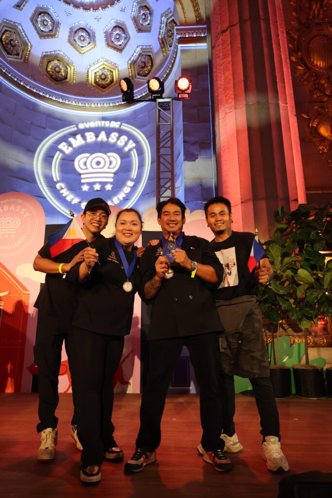 The Namit Filipino Barbecue team celebrates the fruit of their labor, the 2025 ECC People’s Choice Award.