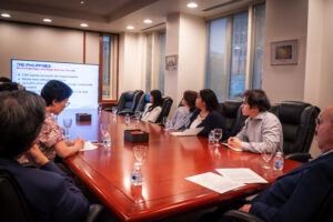 Ambassador Jose Manuel Romualdez (rightmost) and Minister and Consul Lenna De Dios-Sison of the Embassy (left) present on Philippine foreign policy in the maritime domain to officers of the Philippine Cultural Society at the George Washington University.