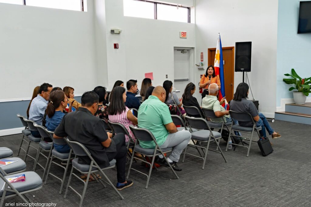 Consul Barbie Rosales fields questions from new dual citizens prior to their oath taking ceremony at the consular outreach mission in Orlando, Florida. (Photo courtesy of Ariel Sinco Photography)