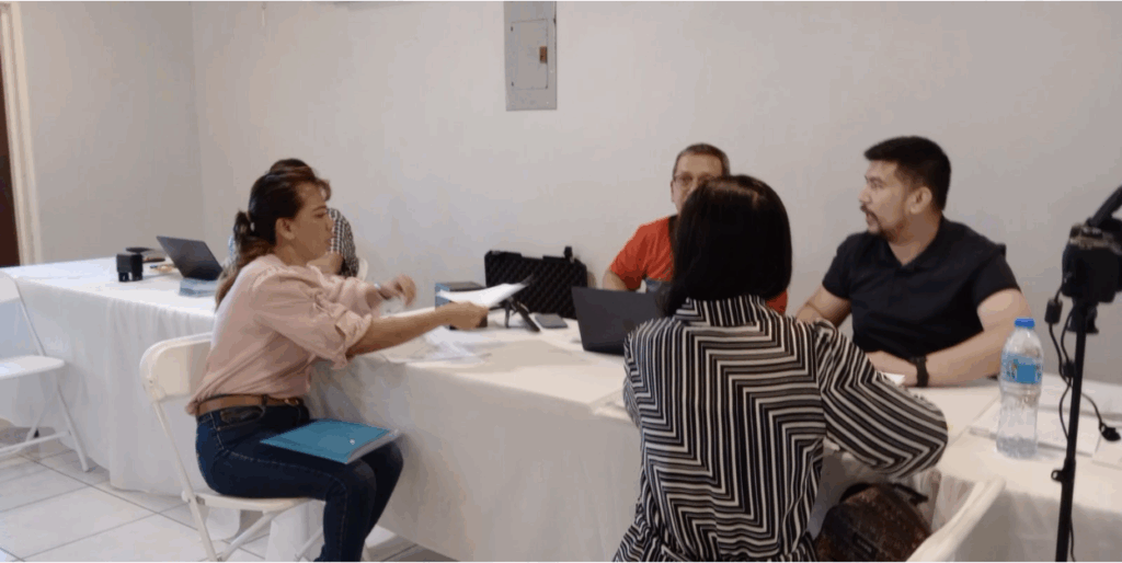 Passport applicants prepare for their documents to be assessed during the Embassy consular outreach to Antigua and Barbuda on 24 October 2025.