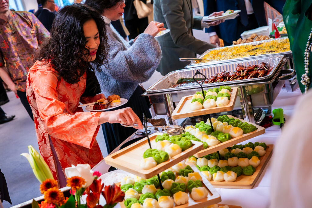 Guests enjoy a selection of Philippine dishes served after the 2025 ASEAN Culture Day program.