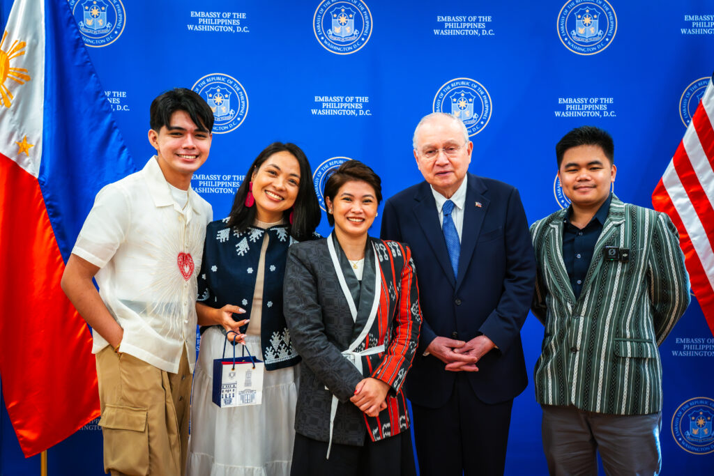 Philippine Ambassador Jose Manuel Romualdez (4th from left) is joined by Filipino influencers (L-R) Raymor Cuevas, Shayne Funcion, Jacque Manabat, and Jonas Tayaban at the Embassy.