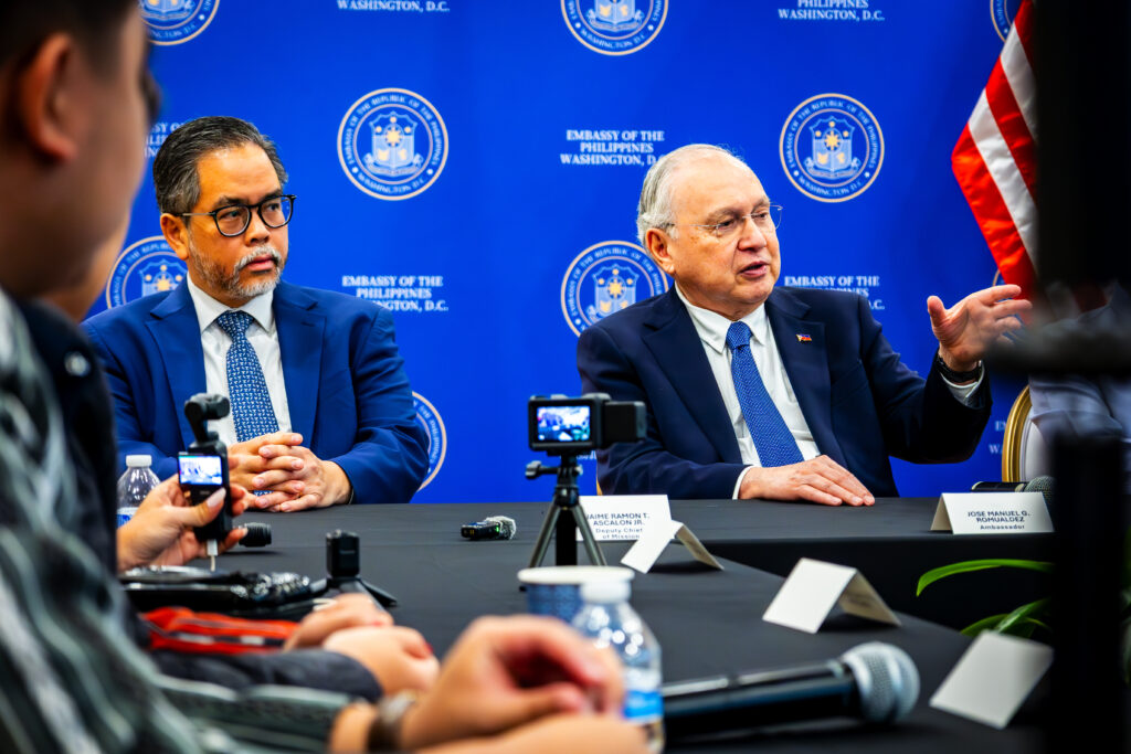 Ambassador Romualdez (right) and Deputy Chief of Mission Jaime Ramon Ascalon engage with participants during the call.