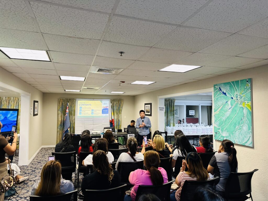 Labor Attache Saul De Vries presents DMW programs and recruitment regulations to OFWs.