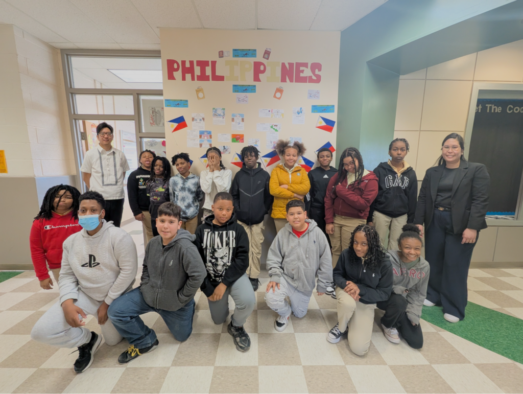 Consul Lim closes the day&rsquo;s final session with students in front of the Philippines wall at Sousa Middle School during the Embassy Adoption Program.