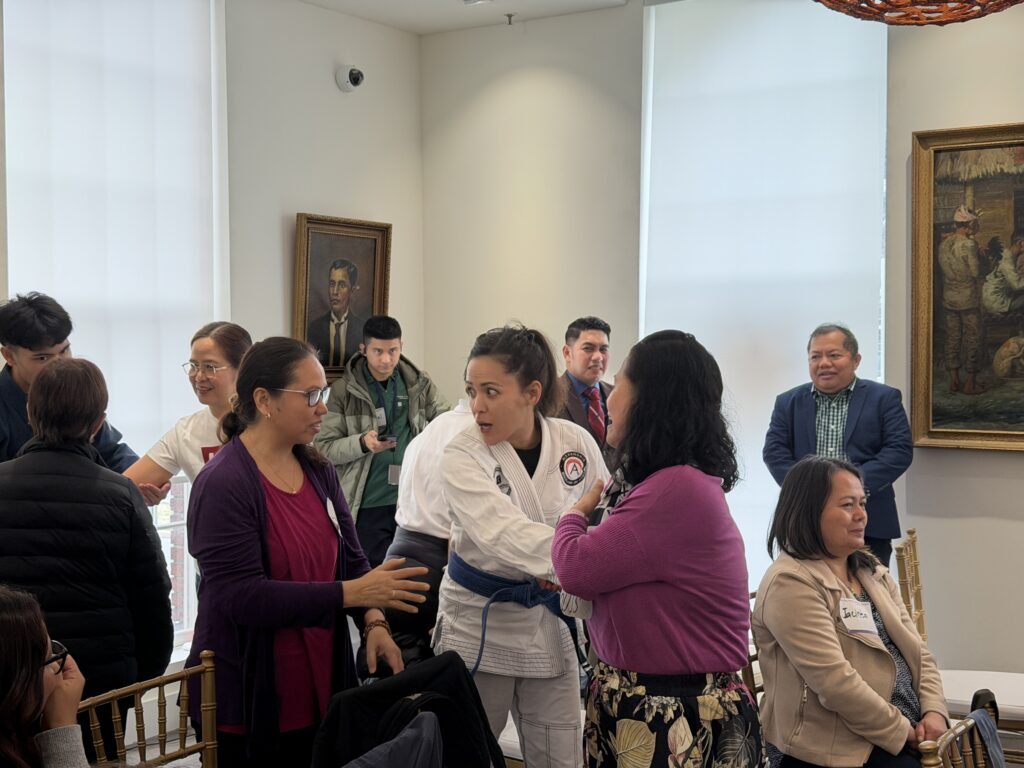 Filipina OFWs were taught basic self defense movements by instructors from Calo Terra Academy and Police General Villaceran.