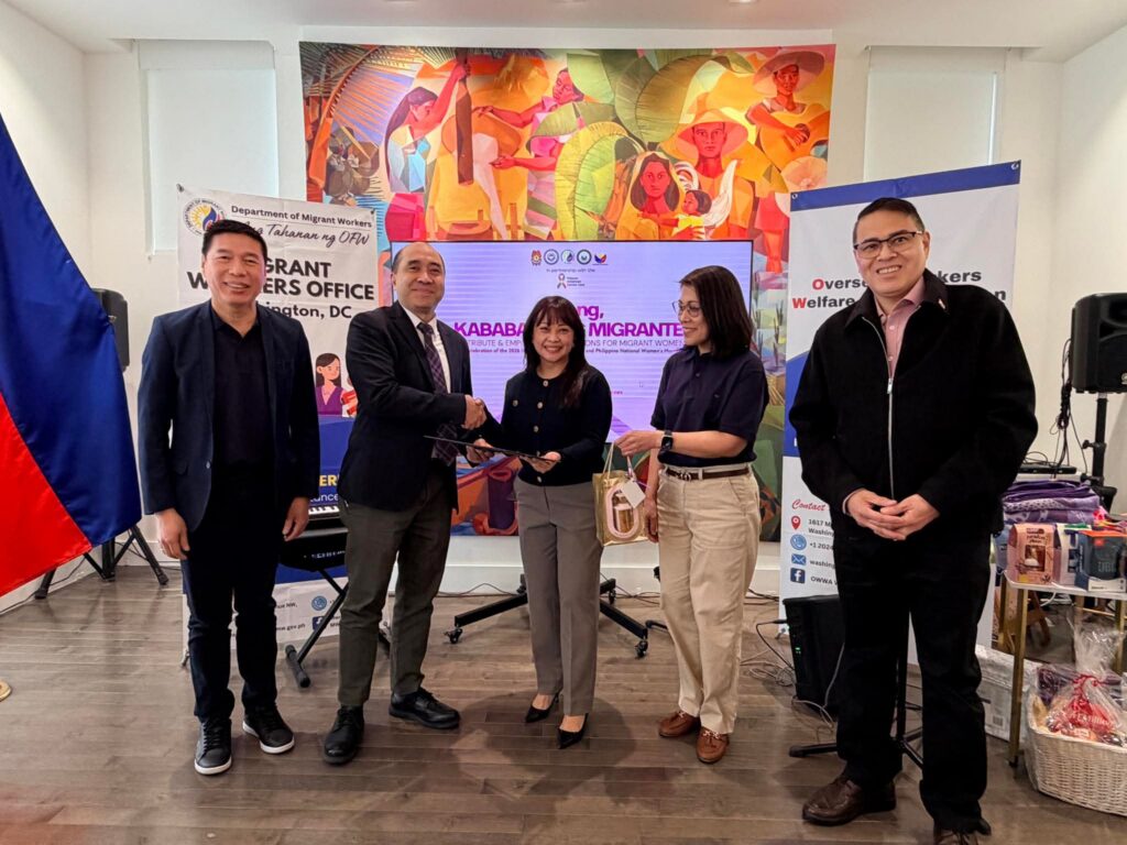 Deputy Chief of Mission Carino hands a certificate of appreciation to Ms. Jessica Palmiano-Bellota who presided over the leadership training session, (from l-r Labatt Saul De Vries, OWWA Welfare Officer Mae Codilla, and Police Attache General Moises Villaceran, Jr.)