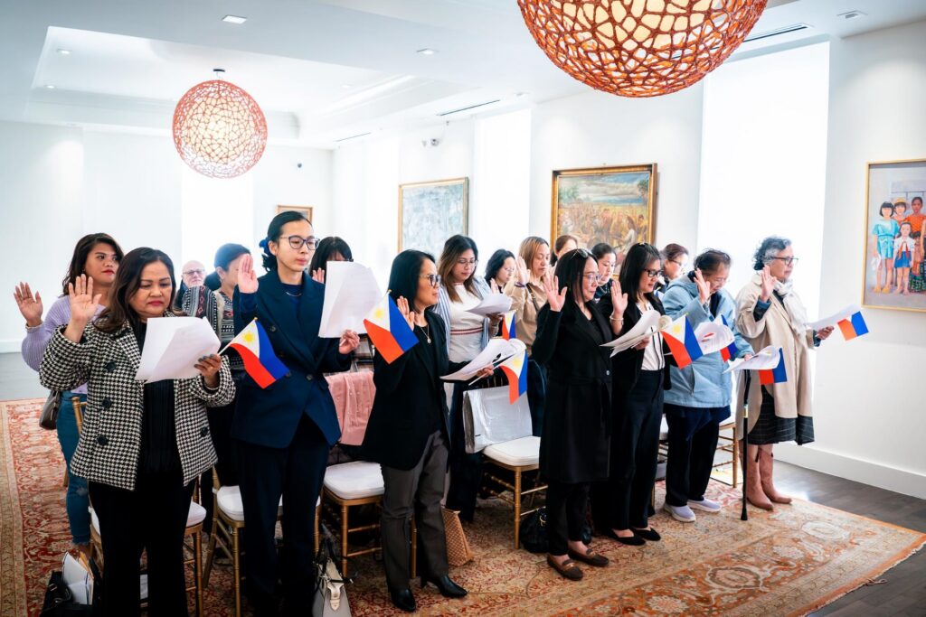 The first batch of new dual citizens who applied during the Philippine Embassy’s Special Saturday Service on 14 March 2026 take their oath of allegiance.