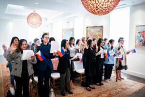The first batch of new dual citizens who applied during the Philippine Embassy’s Special Saturday Service on 14 March 2026 take their oath of allegiance.