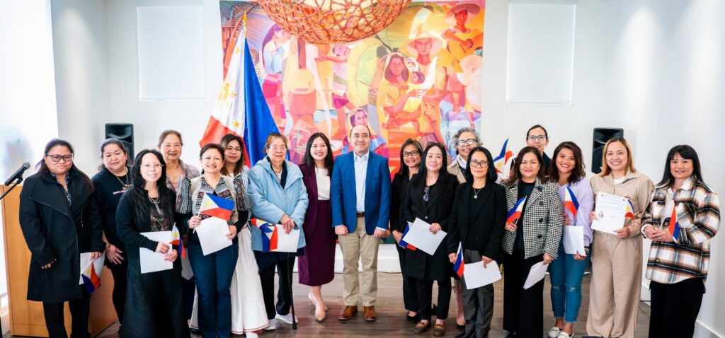 The newly sworn-in dual citizens proudly display their identification certificates alongside Deputy Chief of Mission Felipe Cari&ntilde;o III and Consul Barbie Rosales during a special Saturday service in celebration of National Women&rsquo;s Month. This event highlights the Embassy&rsquo;s dedication to empowering women and strengthening their ties to the Philippines.