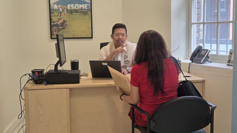 A client (right) consults with Atty. Dion Romano (left) on Philippine property law during a free legal aid clinic at the Philippine Embassy on 17 April 2026.