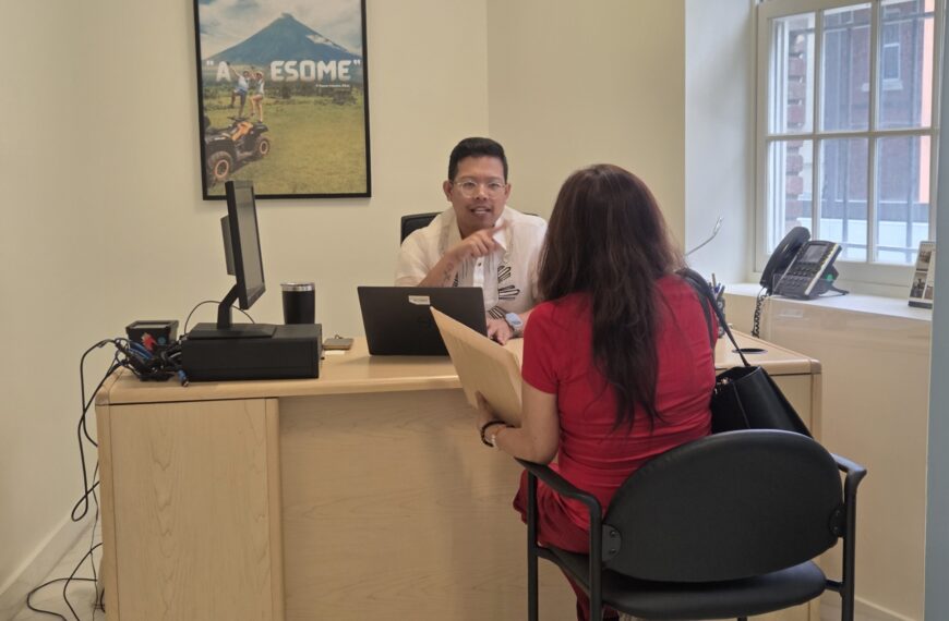 A client (right) consults with Atty. Dion Romano (left) on Philippine property law during a free legal aid clinic at the Philippine Embassy on 17 April 2026.