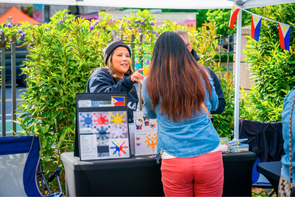 Vendors showcasing Filipino designed and inspired products added depth to the cultural experience, with Colleen Roxas, Kislap Jewelry, and Wika Designs highlighting contemporary Filipino creativity and craftsmanship.