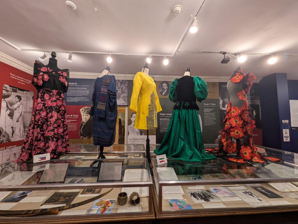 The Philippine Filipiniana (leftmost) ensemble stands alongside international submissions (L-R Mexico, Iran, Ireland, Israel) at the Fashioning Power, Fashioning Peace exhibition at the Woodrow Wilson House, highlighting global expressions of fashion, power, and peace.