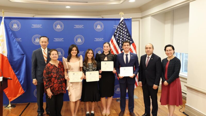 (L-R) US-Asia Institute (USAI) Vice Chairman Ben Wu, USAI President Mary Sue Bissell, 2026 IMPACT! fellows Margaret Jane Piatos, Jasmine Lianalyn Rocha, Reece Roach, and Spencer Smith, and the Embassy&rsquo;s Charg&eacute; d'Affaires Felipe F. Cari&ntilde;o III and Minister Lenna Eilleen C. De Dios-Sison at the conclusion of the graduation ceremony.