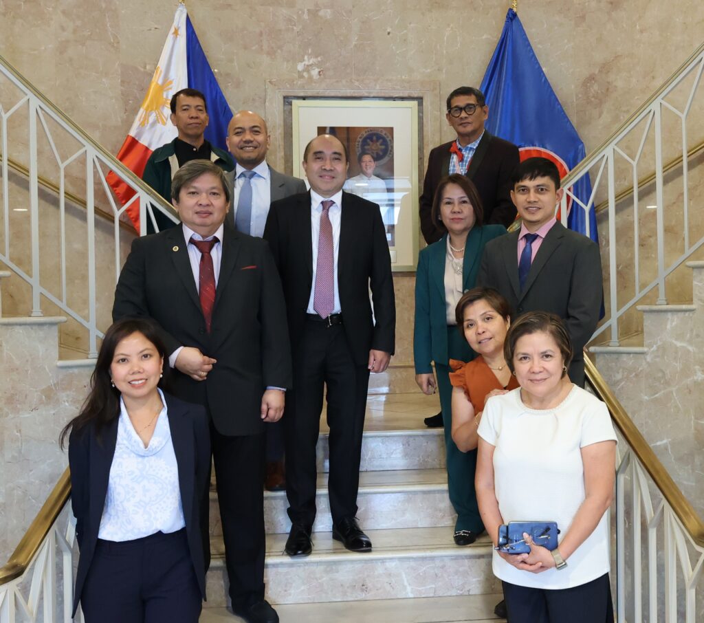 The Embassy team, led by Charge d&rsquo; Affaires a.i Felipe F. Cari&ntilde;o III (center) and the audit team led by Assistant Commissioner Sofia Gemora (right from center) pose for a photo following the exit conference, marking the successful completion of the audit conducted from 20 to 31 July 2026.