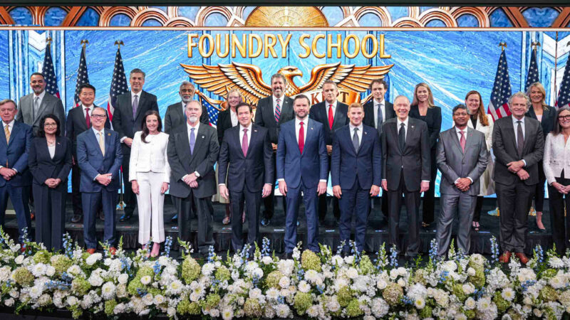 U.S. Vice President J.D. Vance (1st row, 6th from right), Secretary of State Marco Rubio (1st row, 6th from left), and Undersecretary of State Jacob Helberg (1st row, 5th from right) are joined by key university and business leaders during the launch of the Foundry School. (photo courtesy of the U.S. Department of State)
