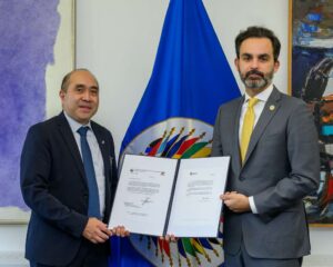 Deputy Chief of Mission Felipe F. Cariño III (left) and Mr. Ivan C. Marques, Secretary for Multidimensional Security of the Organization of American States (OAS), display exchanges of communications formalizing the Philippine contribution to the OAS’s SECURE-Haiti program (Photo credit: OAS)