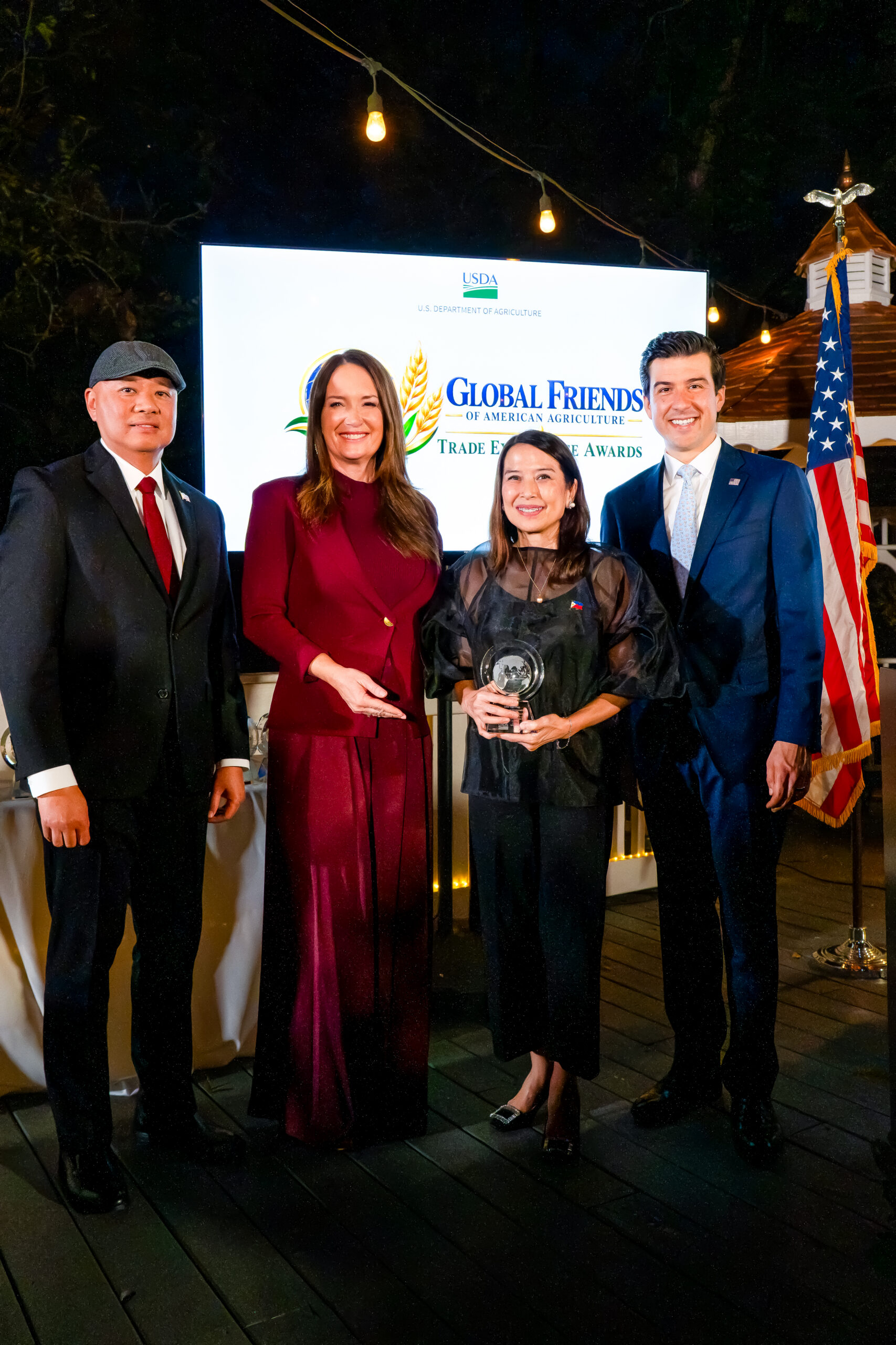 San Miguel Foundation Executive Director Kin Lichauco (second from right) receiving the Trade Excellence Award from USDA Secretary Brooke Rollins (second from left) and Under Secretary Luke Lindberg (right), with Agriculture Counsellor Lupi&ntilde;o Lazaro, Jr. (left) (photo credit: USDA)