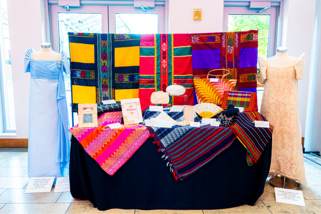 The Philippine booth at the ASEAN Culture Day 2026 displaying other Philippine textiles and accessories, manifesting the artistry and elegance of Philippine designs and craftsmanship.